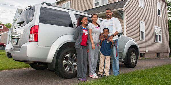 Photo of Hartford family saving money on their car tax.