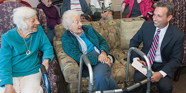 Photo of Senator Duff with seniors.