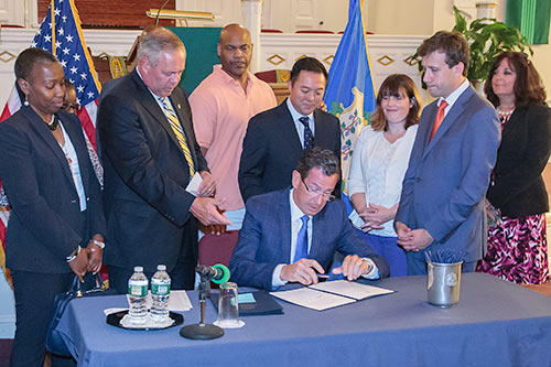 photo of Senator McCrory at bill signing.